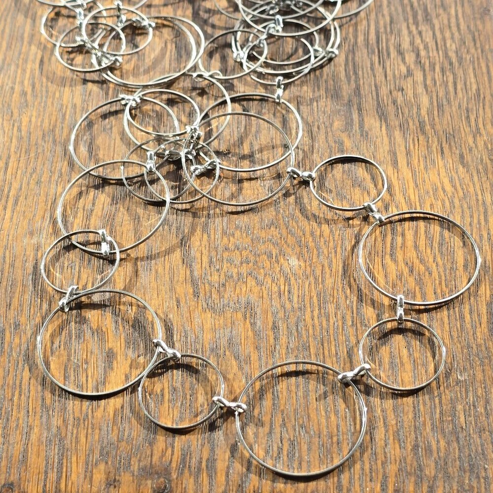 Extraordinary delicate hoop-chain necklace & earring set.